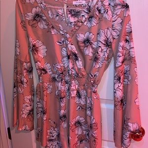 Very cute romper// worn once